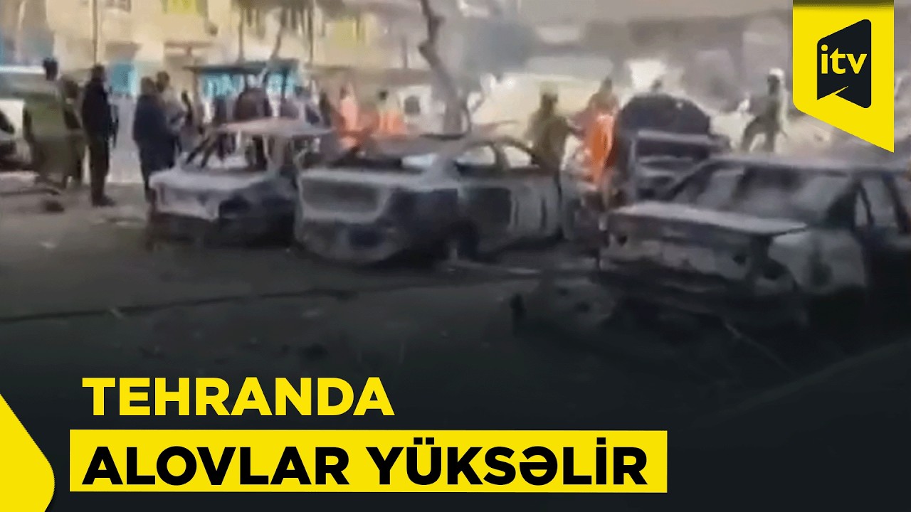 Tehranda baş verən partlayışlardan sonra avtomobillər yandı
