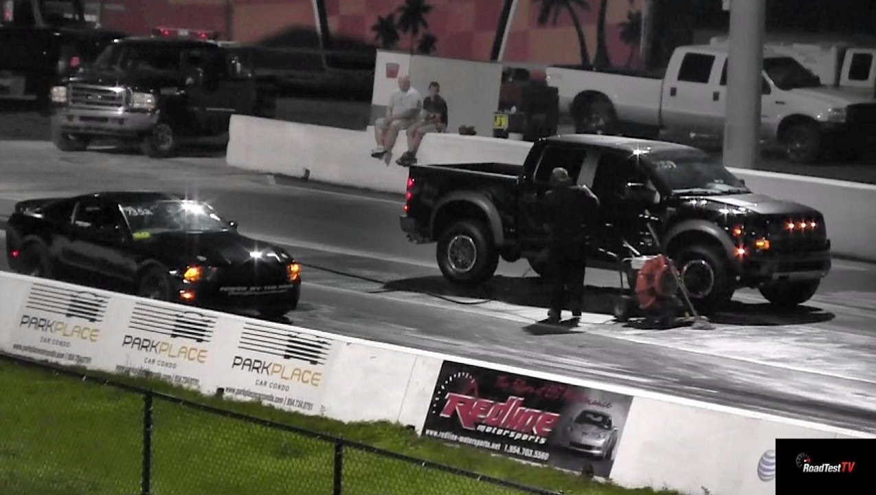 950 HP ProCharged Mustang GT 5.0 vs Ford Raptor SVT Crew Cab - Drag Race Video ®