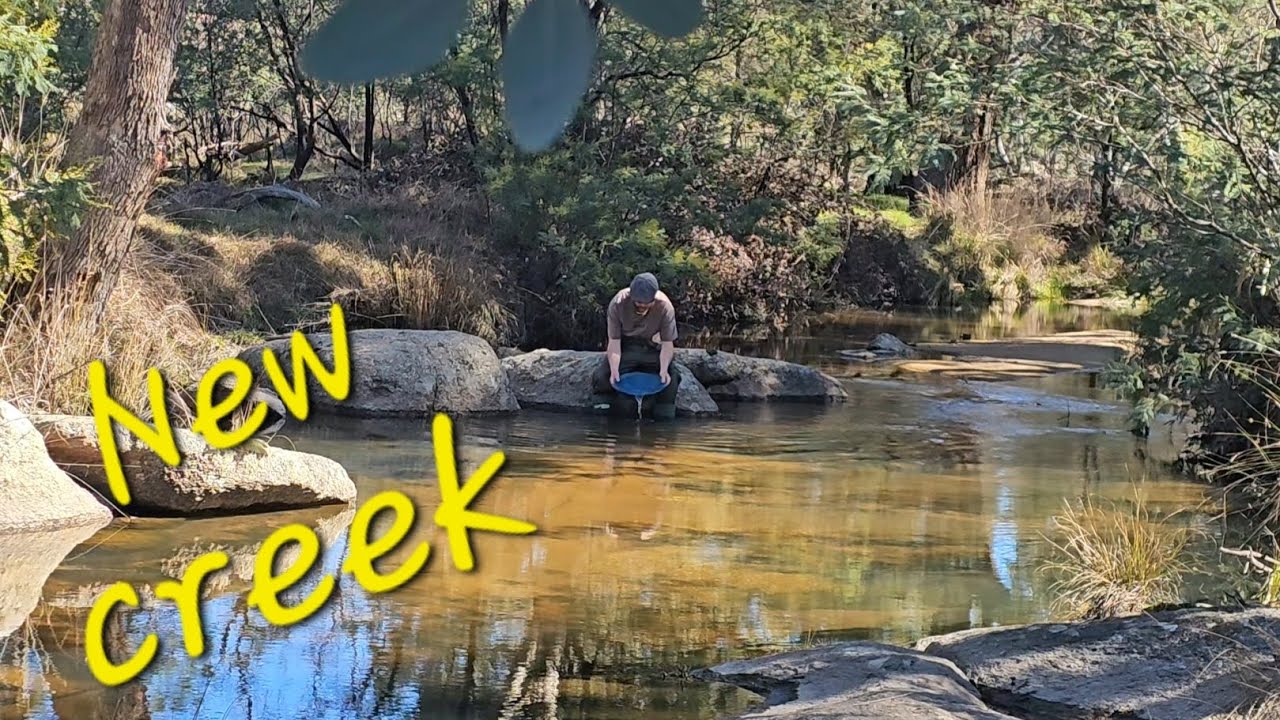 Exploring a new creek for Gold and old timers workings.