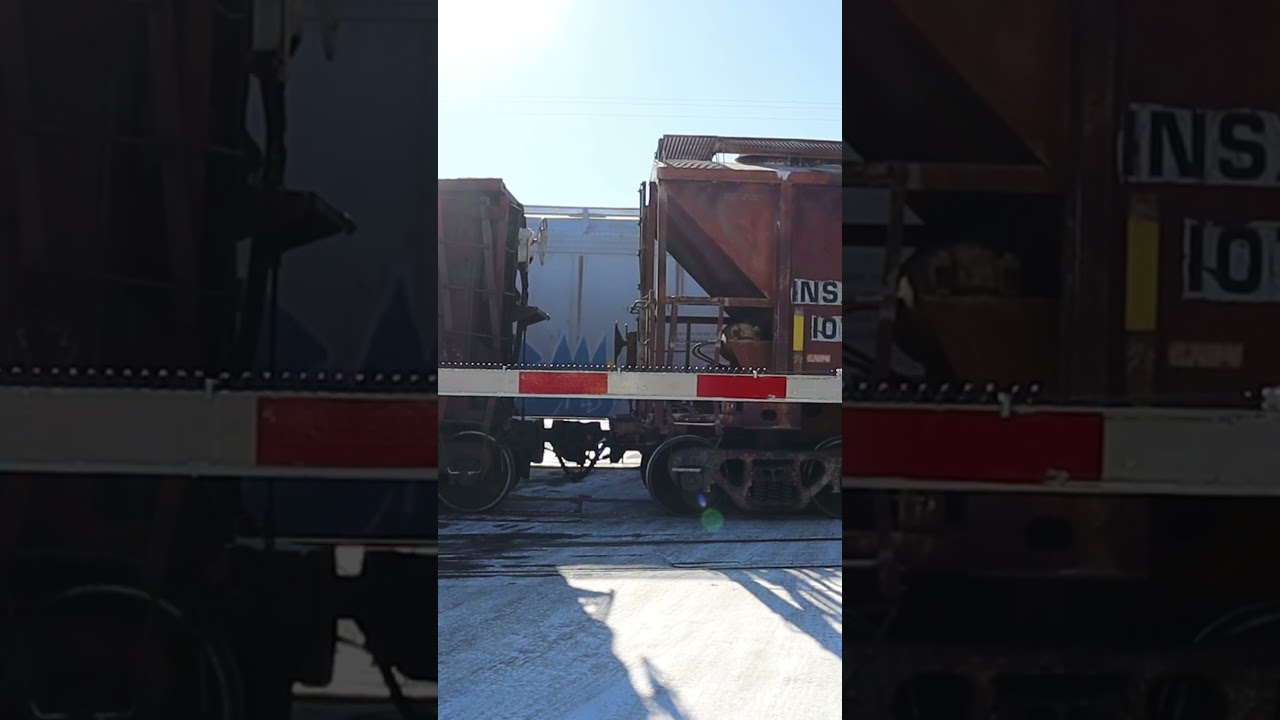 UP Grainer Waits as Mixed Freight Slides by, Savage, MN #up #train #trainvideo #railway #railroad