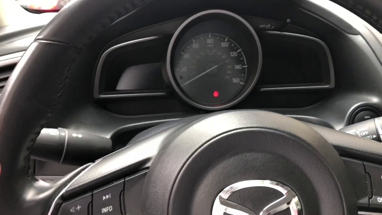 Mazda Vehicles - How to open fuel door to add gas