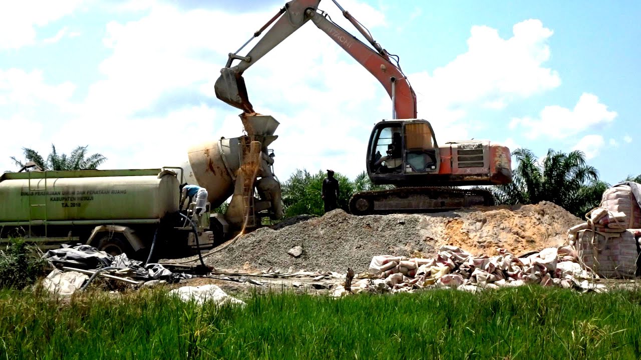 Massive Concrete Truck Mixer Excavator Make Fast Progress in Remote Village Project