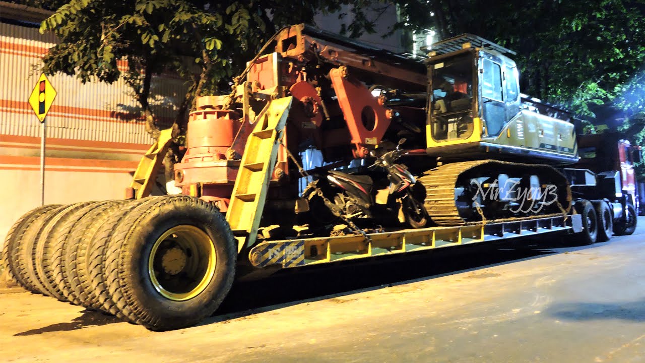 Volvo F10 Nissan UD Trucks Loading Drilling Rig Sany SR150C
