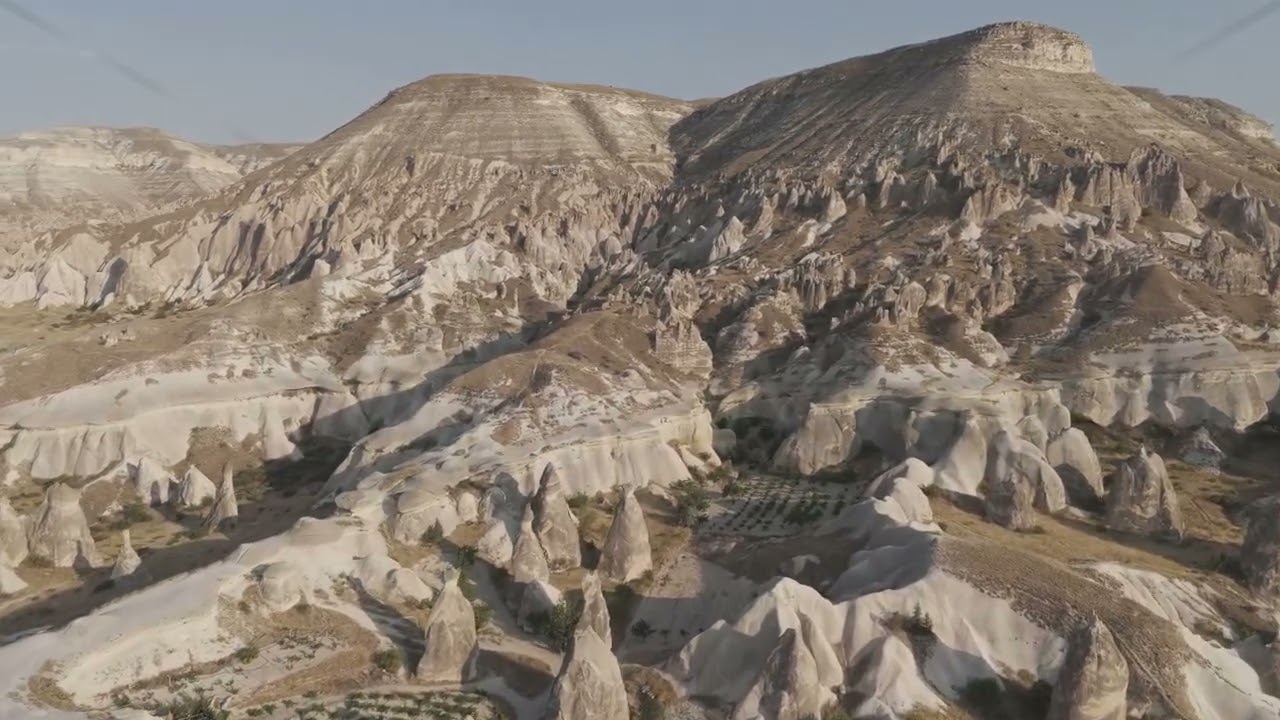 D-Log M. Goreme, Nevsehir, Turkey. Aerial view of the unique mushroom-shaped fairy chimneys in Pa...
