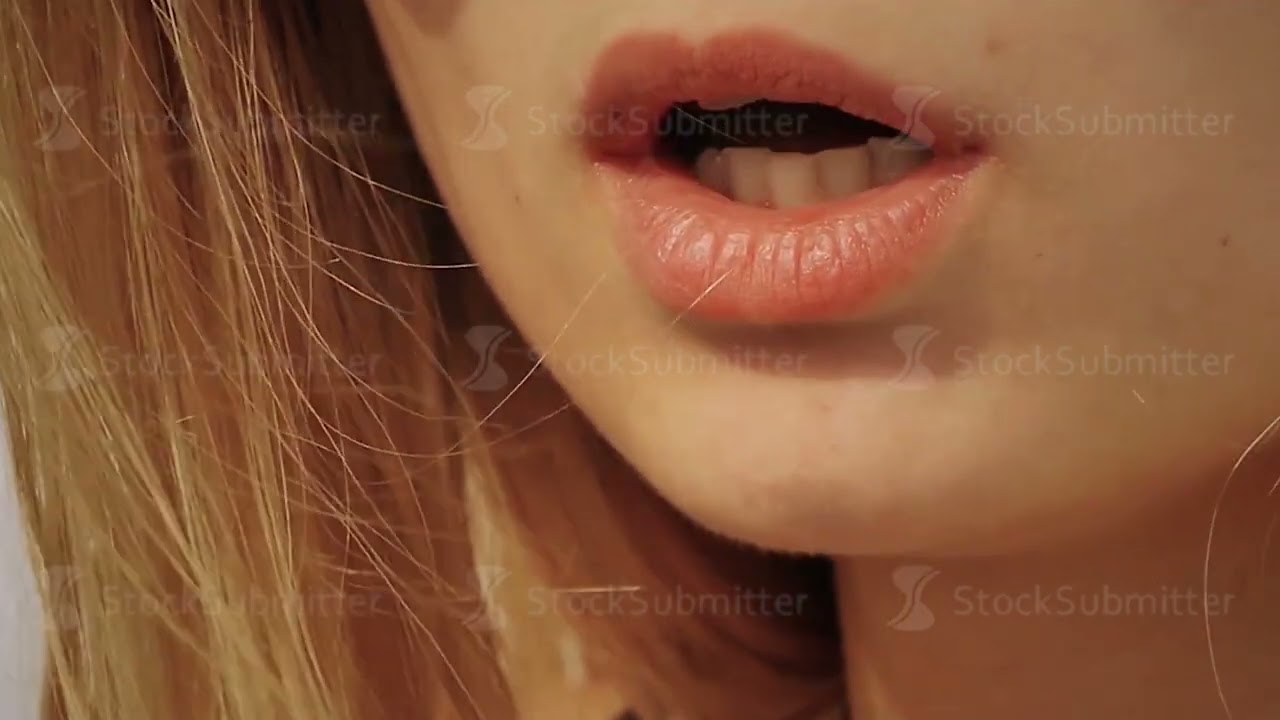 the girl smokes a cigarette closeup. sexy smoking beautiful woman cigarette closeup. Front view face