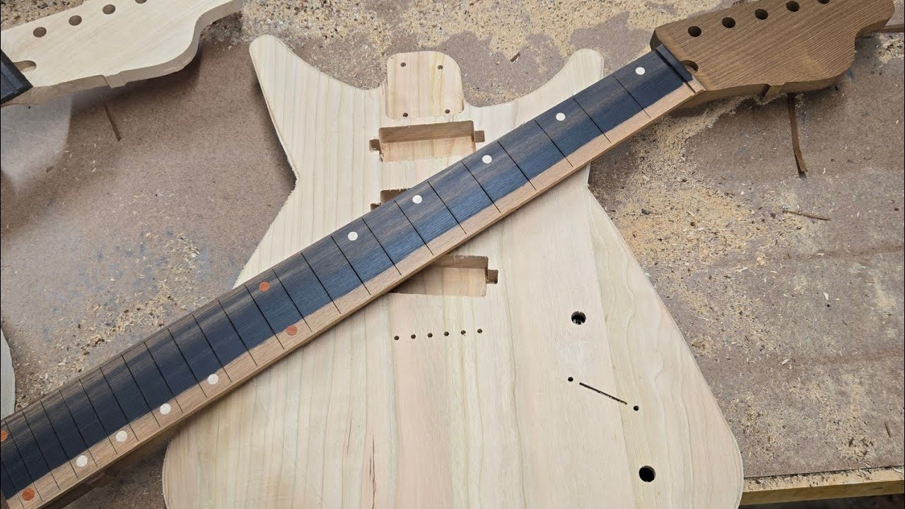 Carving a Conduit. Thomas Muse Guitars is live!