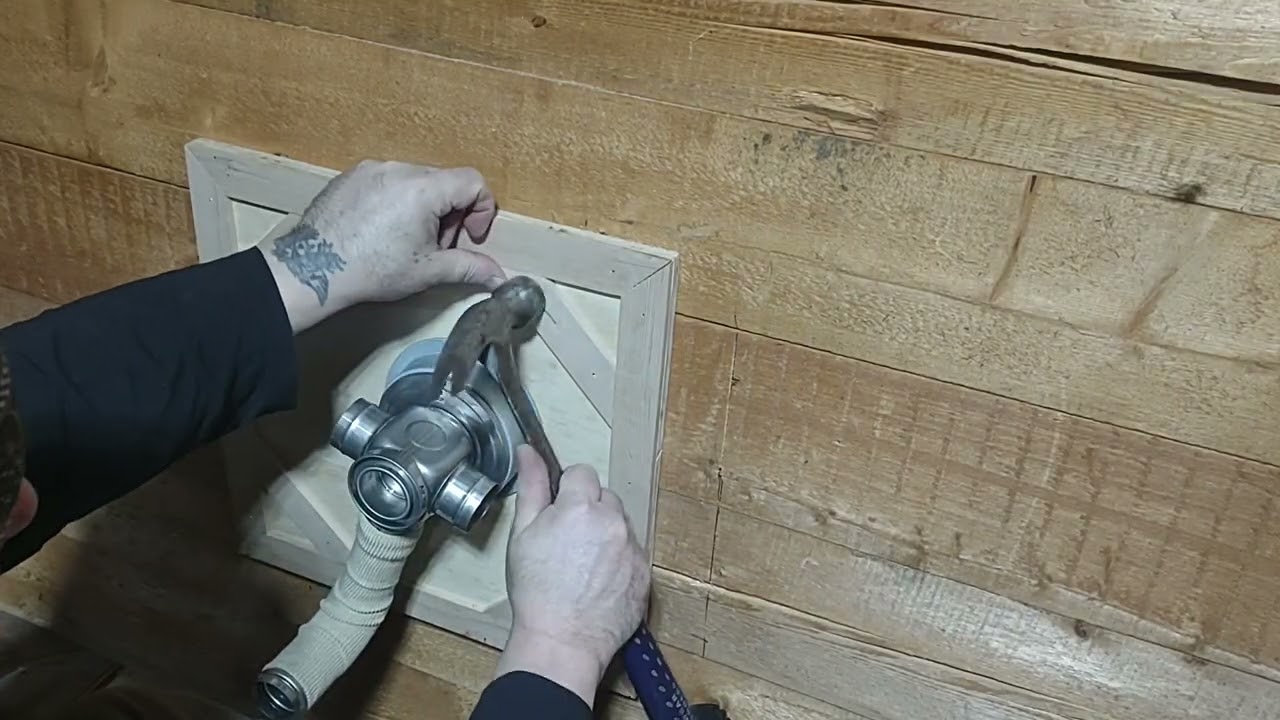 DIY Hippie the handyman heater installer. Toyotomi Laser 534 in graphite. Inside exhaust plate.