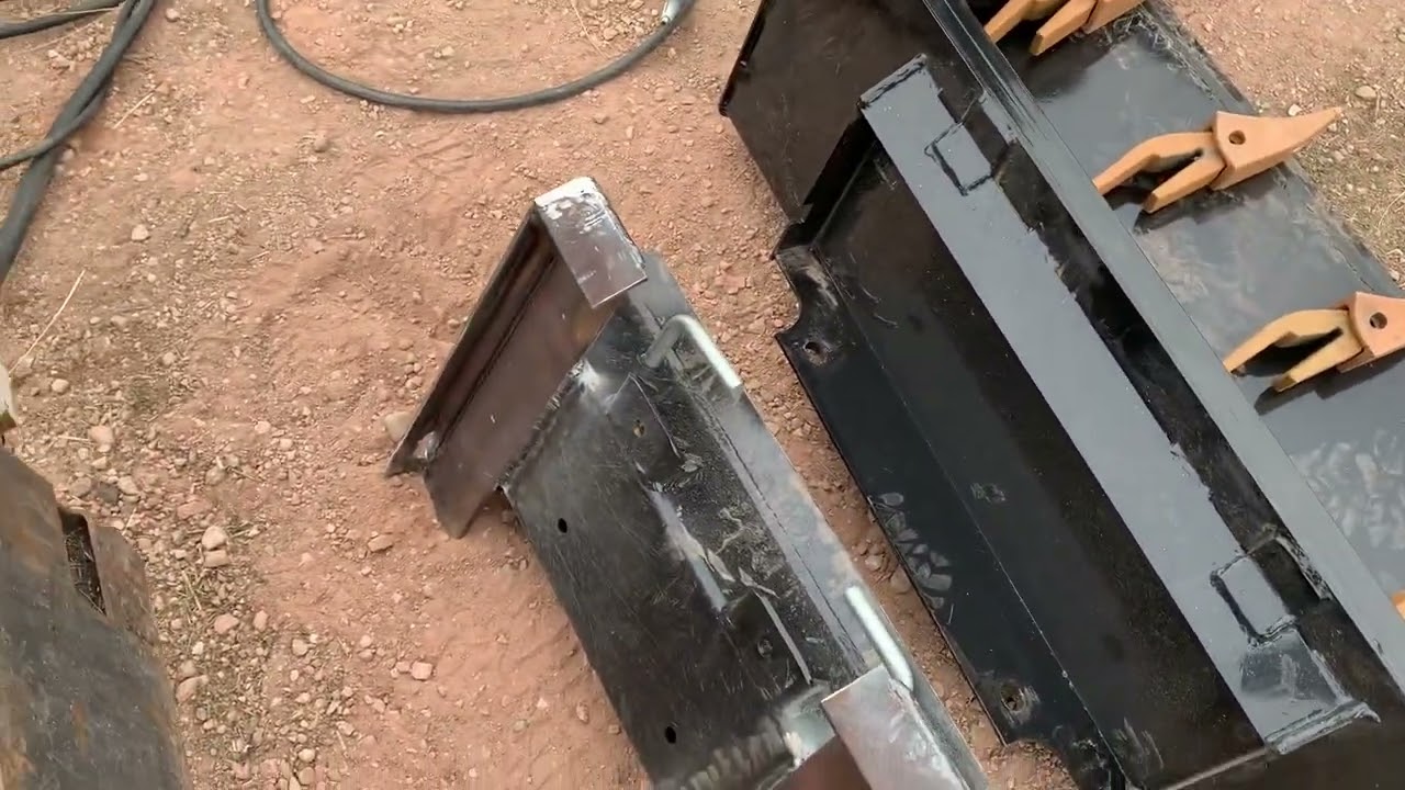 Bobcat 453 adapted to Dingo style quick attach