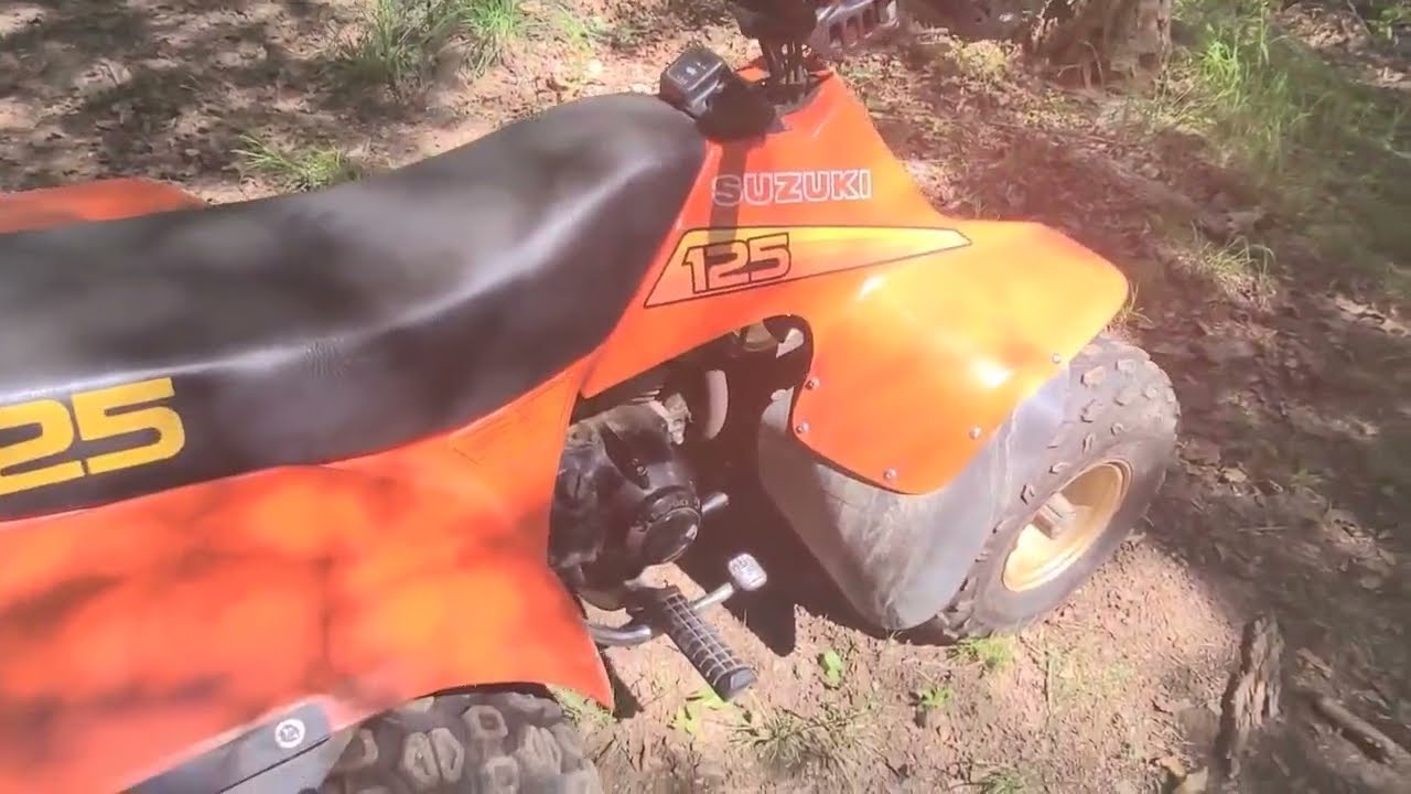 Clutch adjustment on 1984 suzuki LT-125 four wheeler .