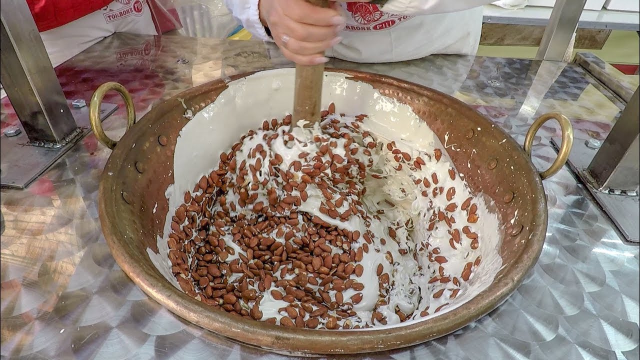 Italy Street Food. Making by Hand Sweet Almond Nougat from Sardinia