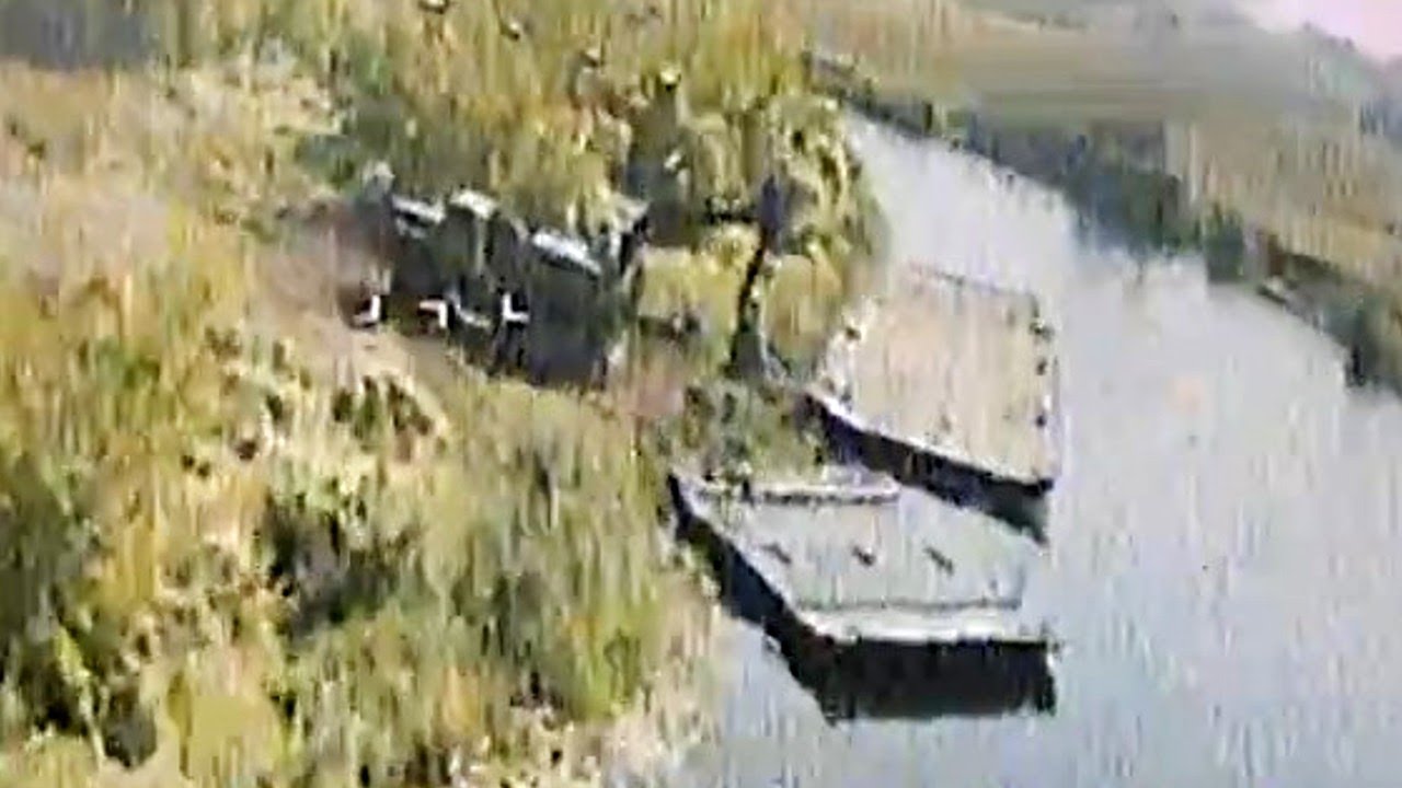 Ukrainian forces destroy a Russian pontoon bridge in the Kursk region.