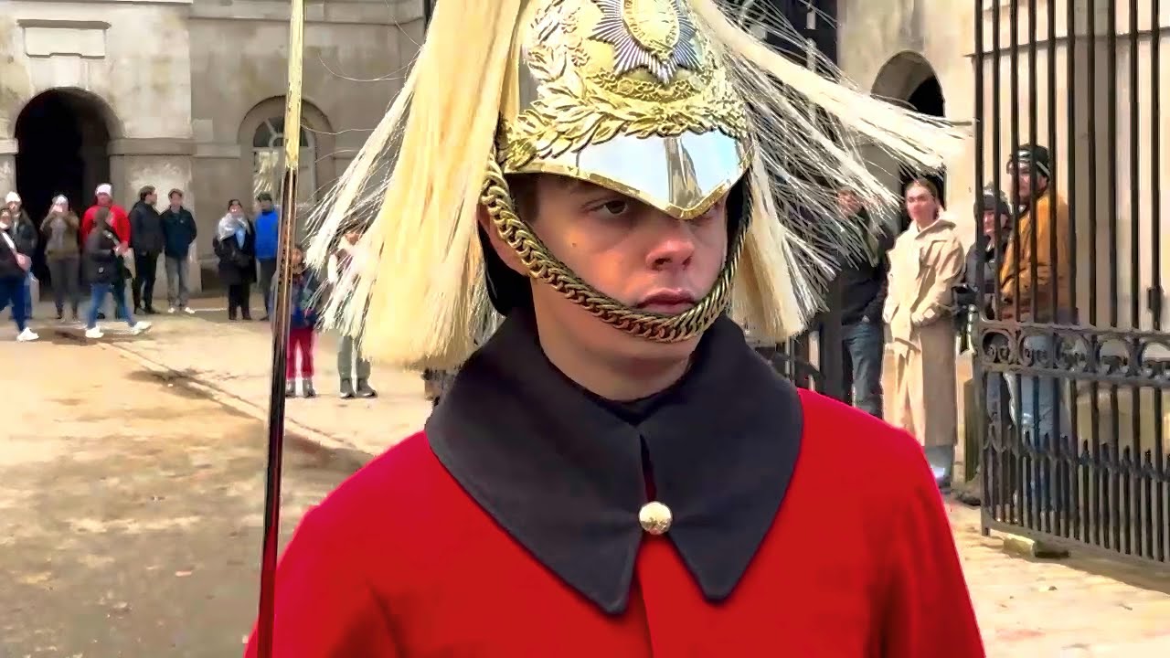 When Time Stands Still: The King's Guard vs. Snap-Happy Tourists