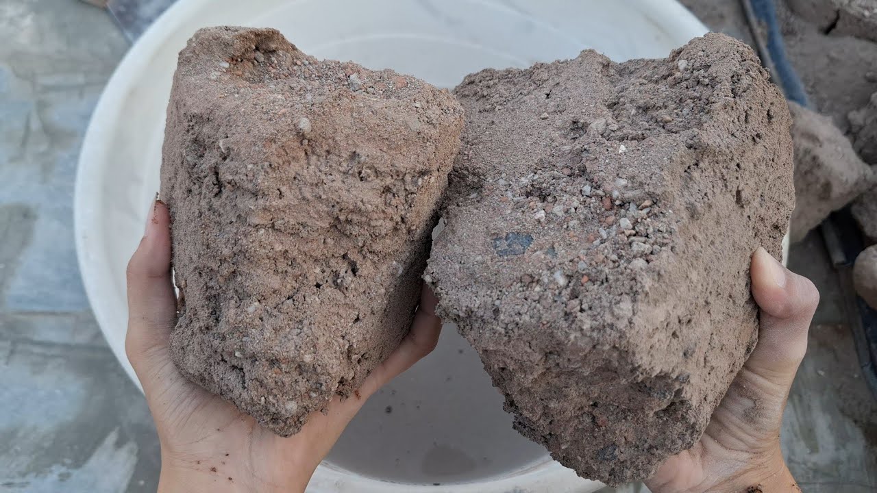 New video brown grainy sand water crumbling satisfying