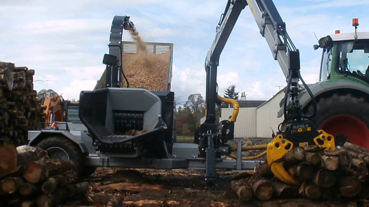 Kesla C645S Chipper in action with the Kesla 305T loader feeding