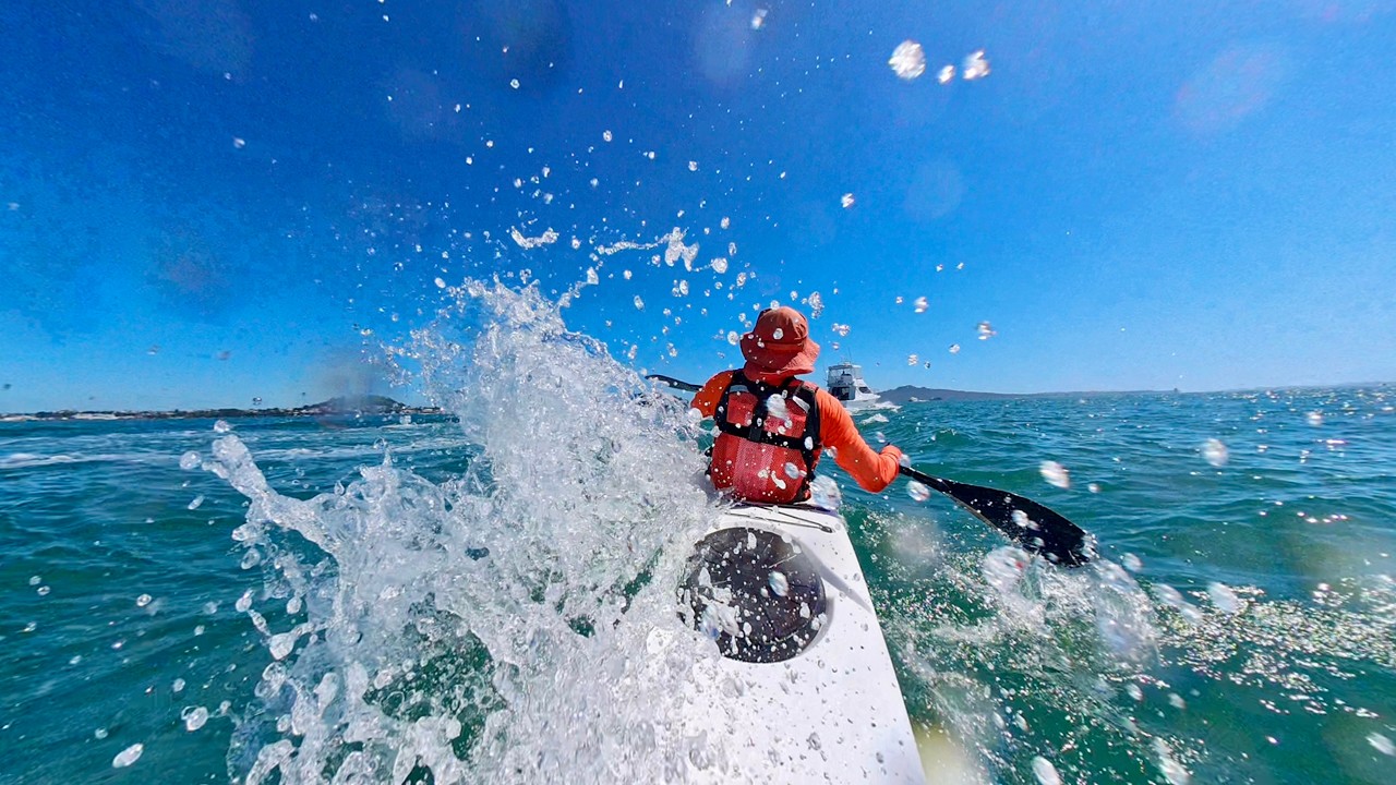 Chasing waves by the boat channel - NK Breeze & Fenn Blue-Fin S surfskis