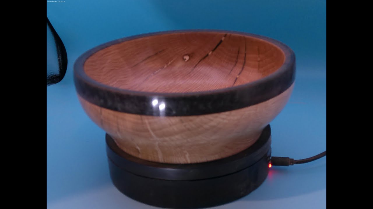 I have turned a Beech bowl and included a resin rim, using acetate roll and hot melt glue #121