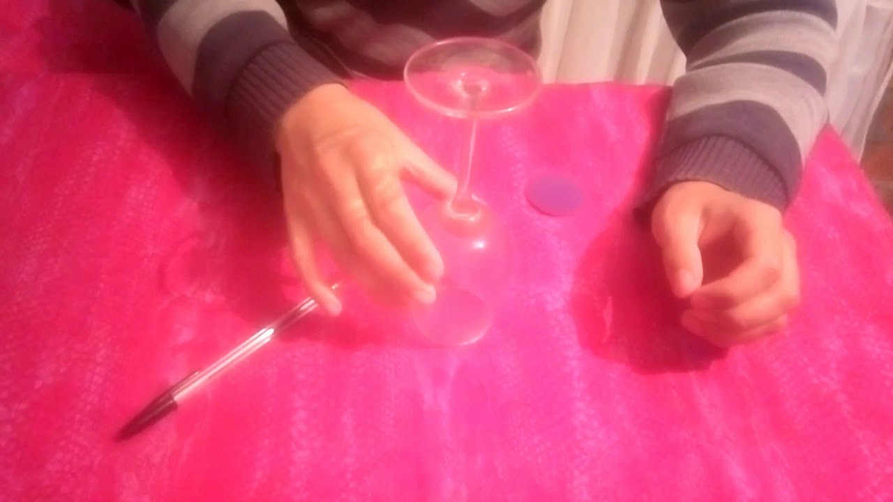 magic trick: wine glass and coin trick