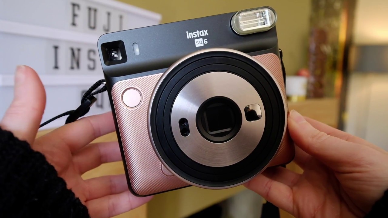Lizzie trying out the Instax SQ6