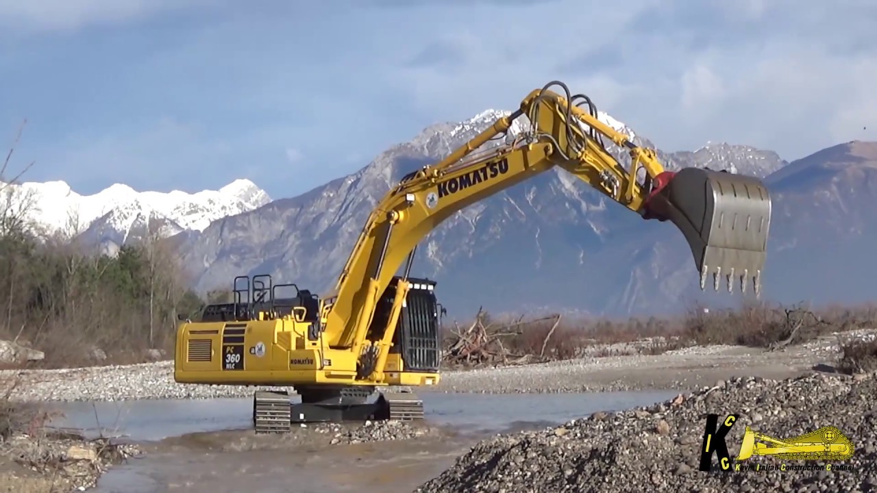 Komatsu PC360NLC-11 Excavator Digging Gravel in the Water