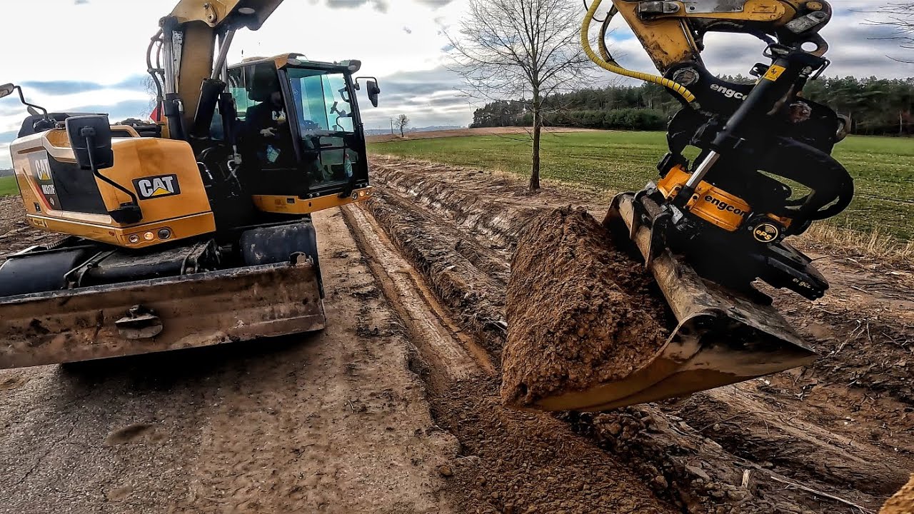 Cat M317F tiltrotator Engcon - zasypywanie poszerzenia