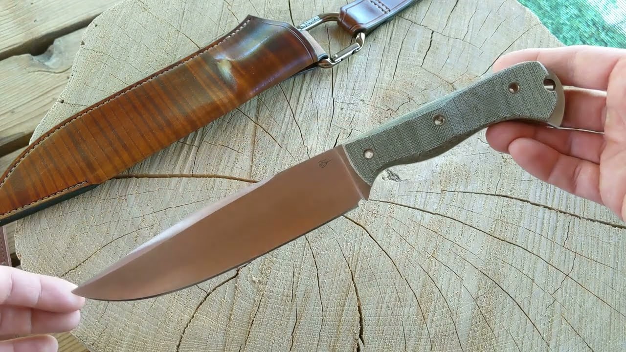 Custom made camp knife with TeroTuf scales and leather dangler sheath