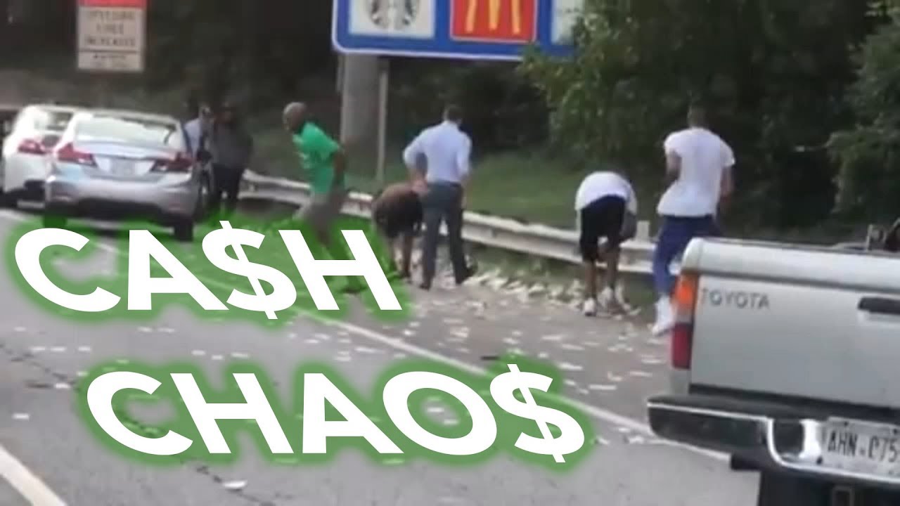 Cash Chaos: Drivers stop to grab money dropped by armored truck