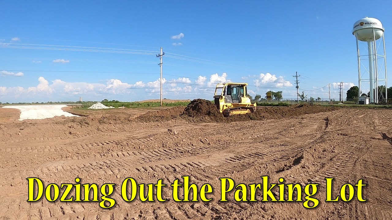 Stripping The Topsoil Off The Parking Lot Area With The Komatsu D41e