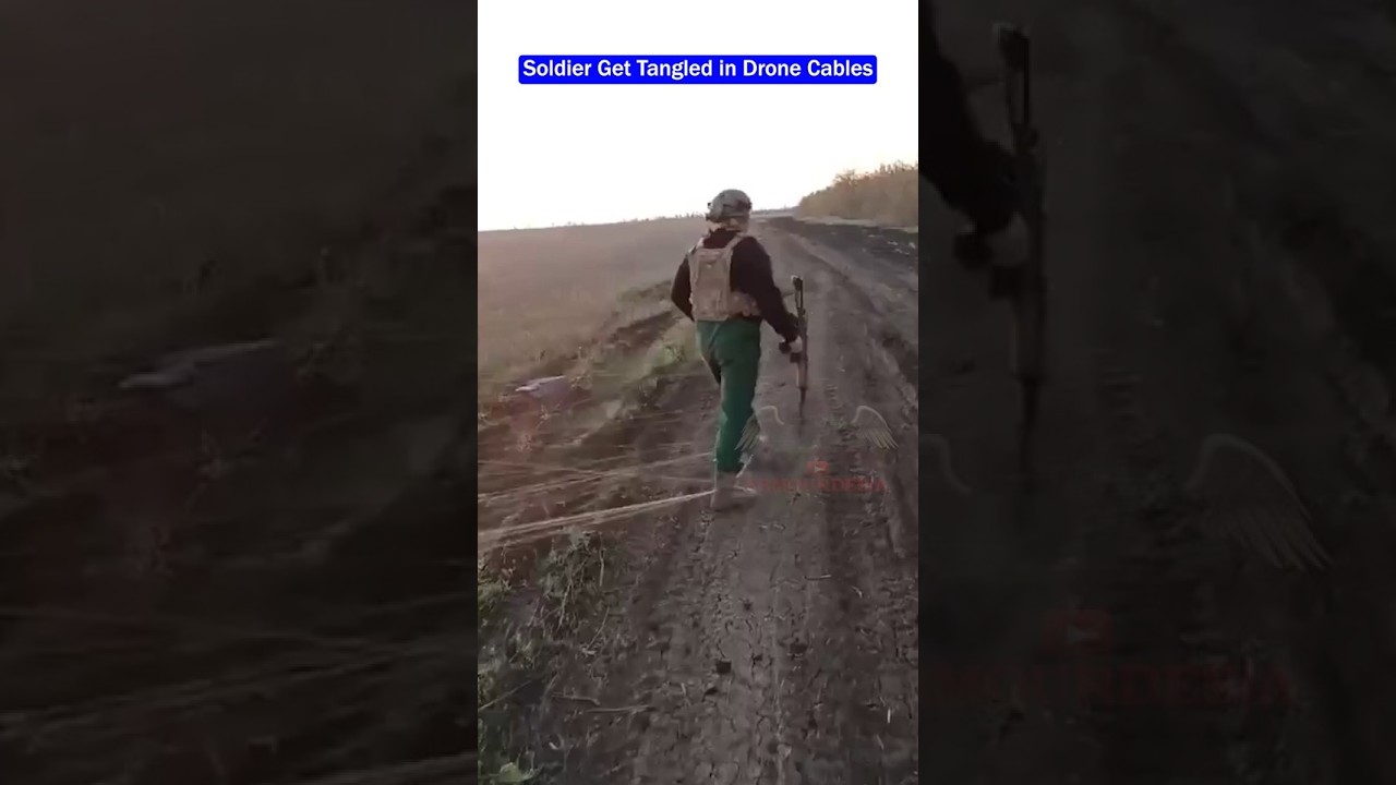 Soldier Walks Through FPV Drone Optical Fiber cables Field