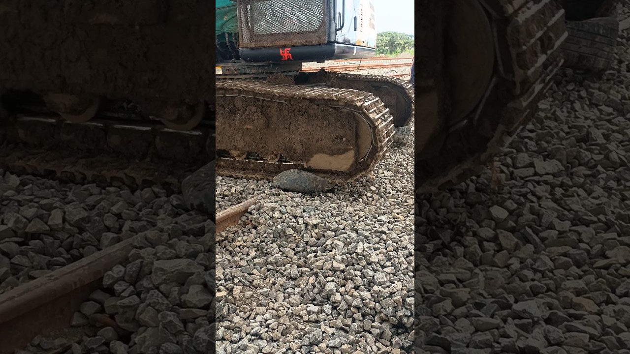 Process of the excavator moving from rail track #viral #reels #trending #video #shorts #shortsfeed