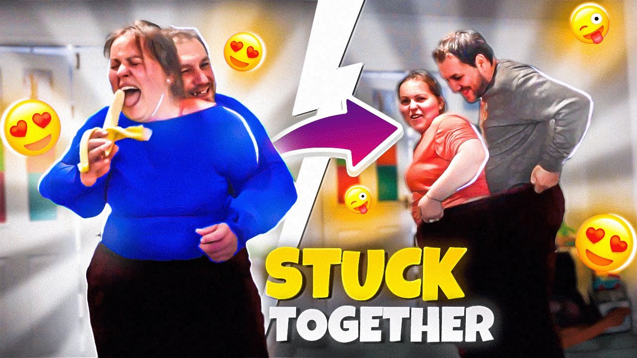 COUPLES STUCK TOGETHER CHALLENGE ! HILARIOUS STUCK TOGETHER IN A ONESIE CHALLENGE Part 1
