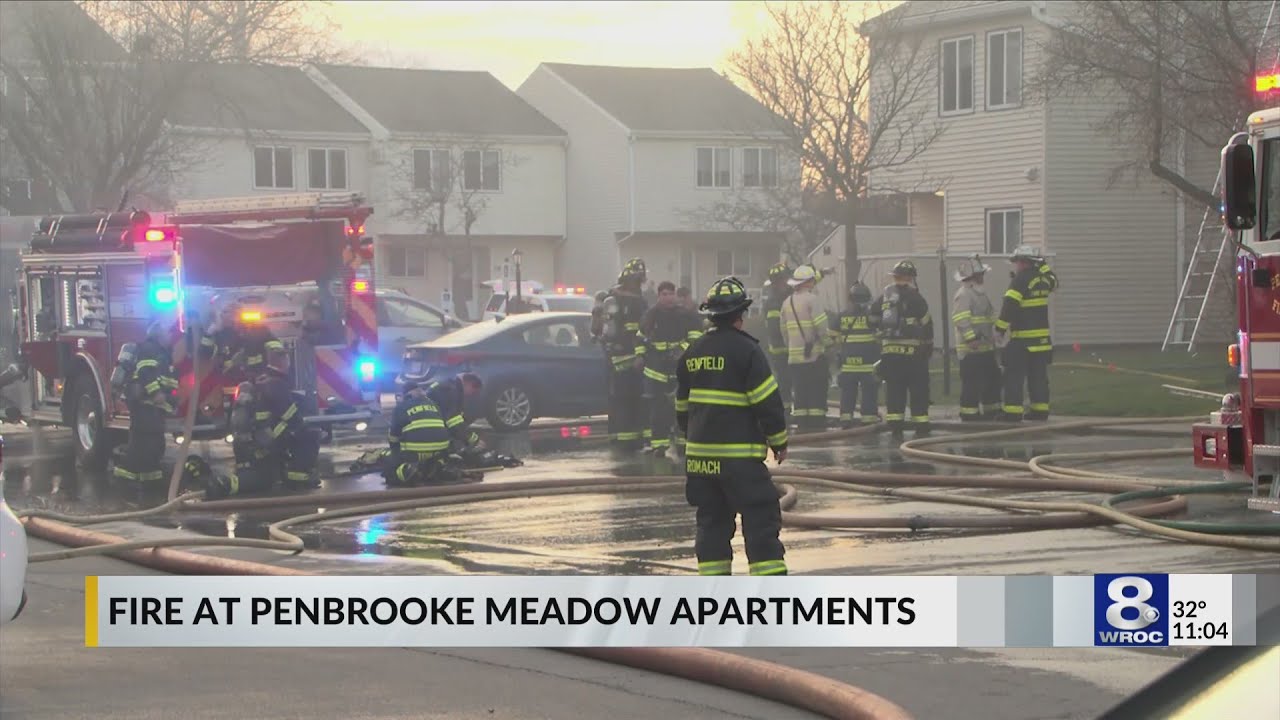 Firefighters putting out flames at Penbrooke Meadow Apartments
