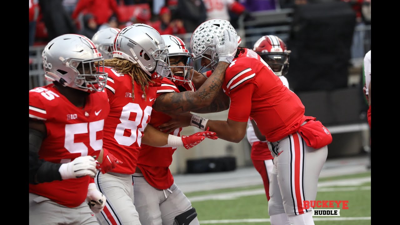 Ohio State 5th-year senior WR Kamryn Babb is mobbed by teammates following first career catch (a TD)