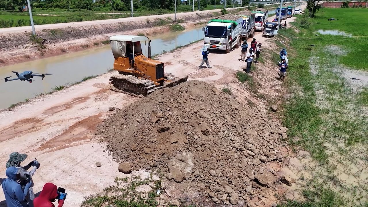 Heavy Equipment at Work! New Land Filling Project — Bulldozer & Dump Trucks Powerfully Pushing Soil