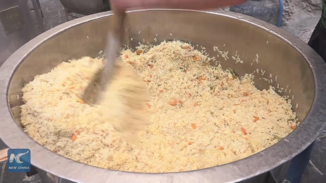 Charity kitchens help poor people in Syria's Damascus during Ramadan