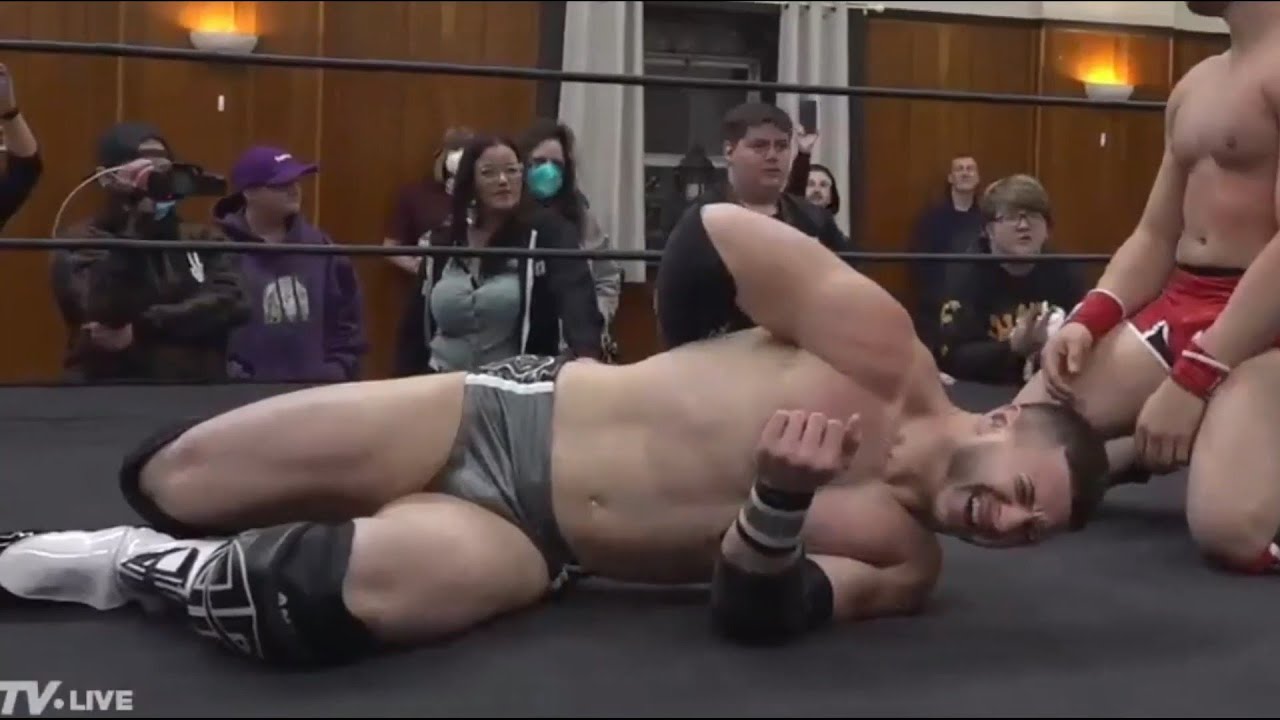 Men of wresstling- young  Wrestlers squashed in the ring