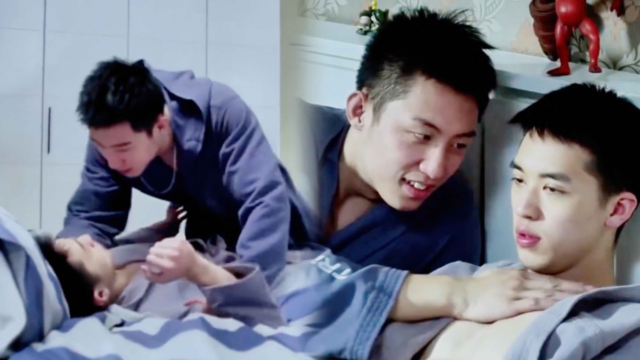 Younger brother pulls away to protect him, but older brother breaks in and pulls him into his arms.