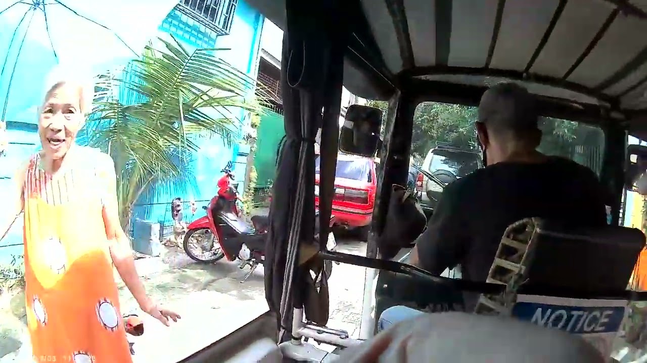 Taking the tricycle through the streets of Antipolo City  Philippines part 3 of 3.