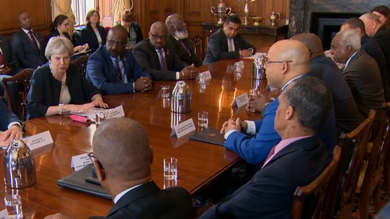 Theresa May apologises for treatment of Windrush generation