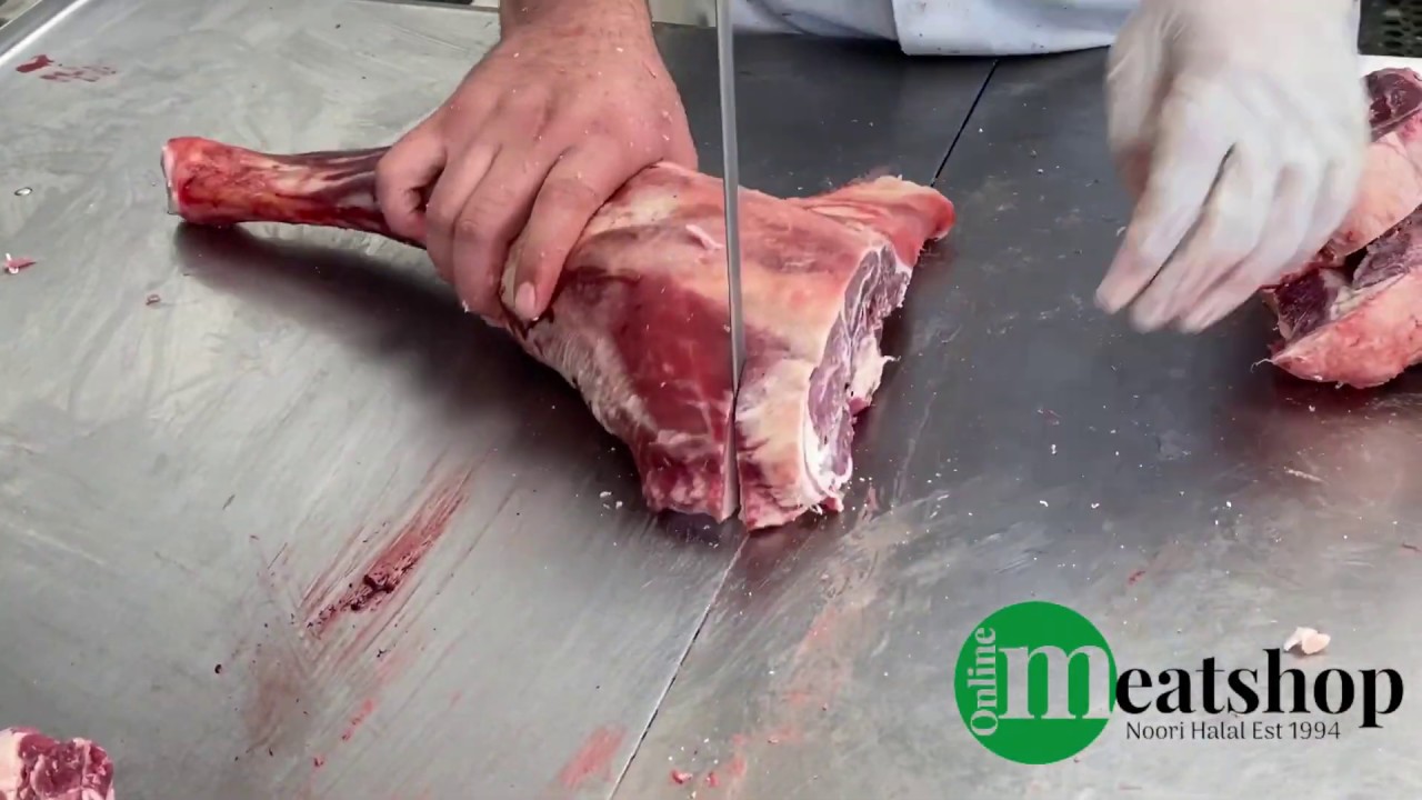 Cutting half fresh halal mutton on bandsaw machine - onlinemeatshop