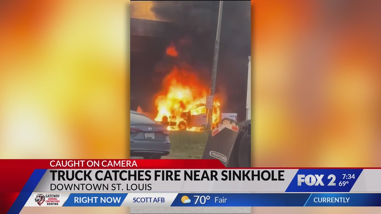 Vehicle catches fire near sinkhole in downtown St. Louis