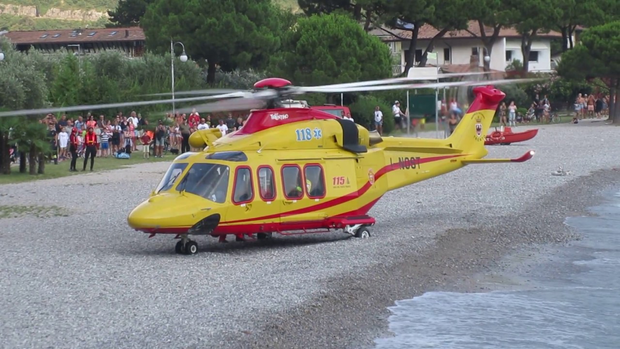 AW-139 TRENTINO EMERGENZA IN DECOLLO DA SPIAGGIA TORBOLE