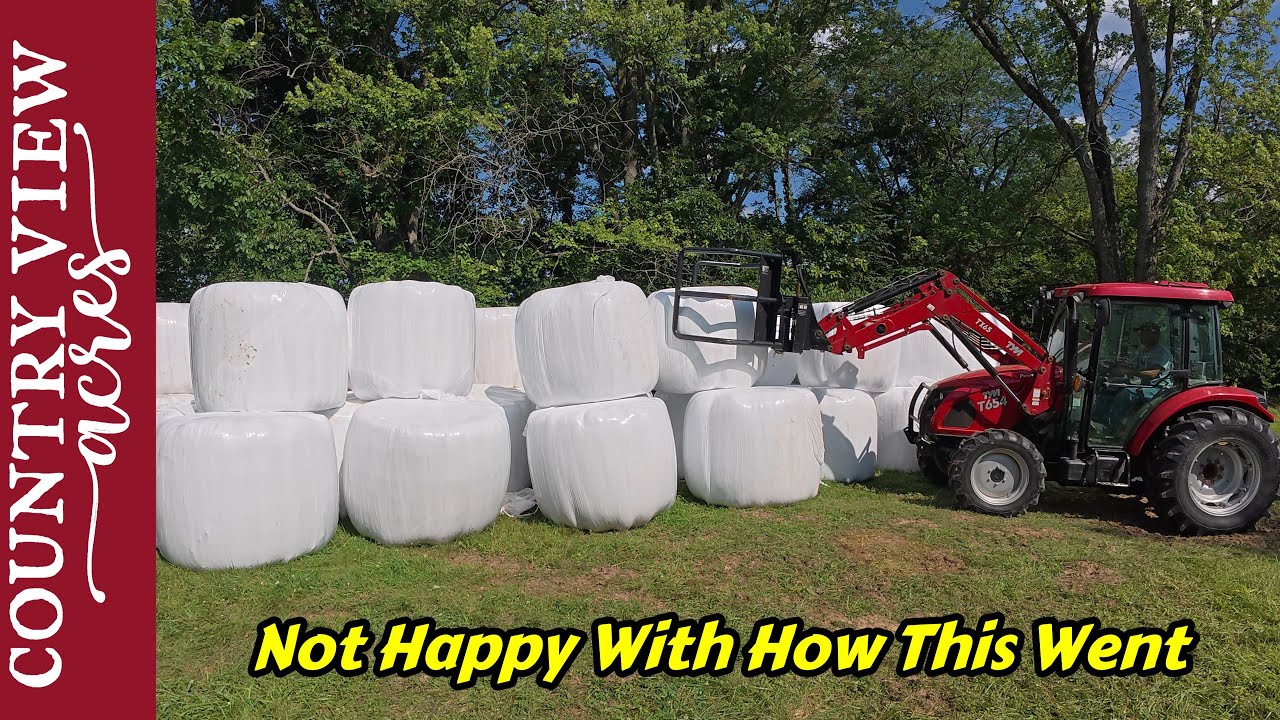 A Day Full of Tractor work   Grinding Stumps, Fertilizing Fields, and Stacking Bales