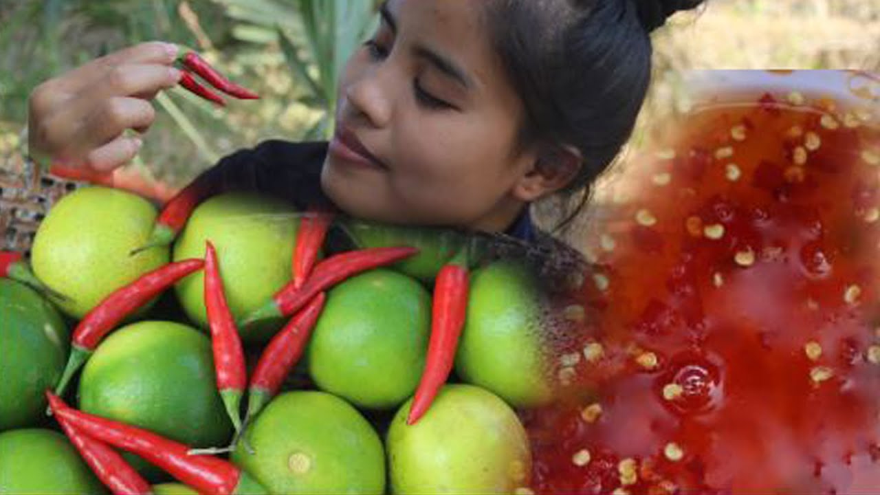 Cute girl eating Lime Fruit with Chilly and fish sauce| YuwaDaily Life