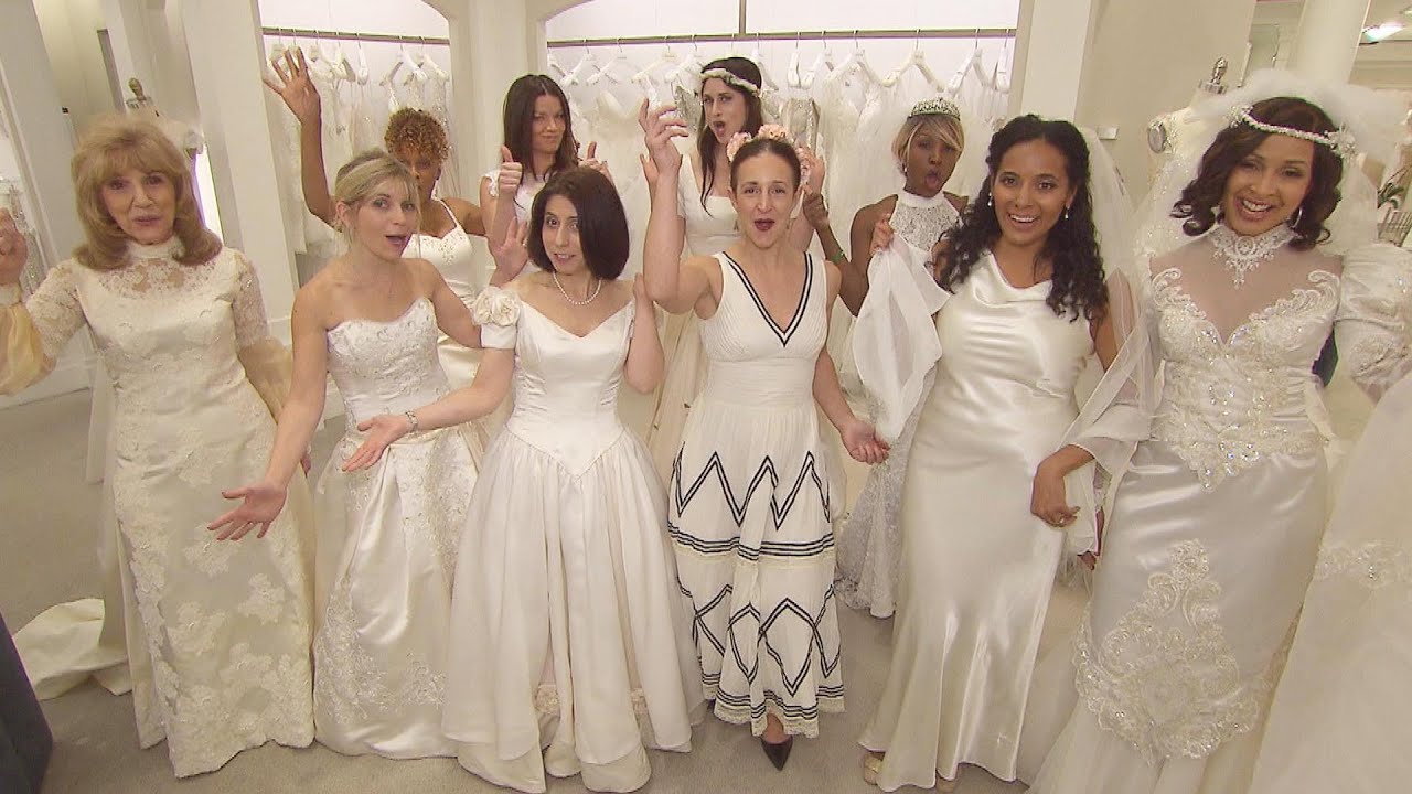 Women Try On Wedding Dresses to See if They Still Fit