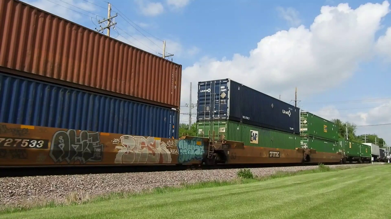 UP engine 2560 a C45AH leads a bird west through Geneva IL