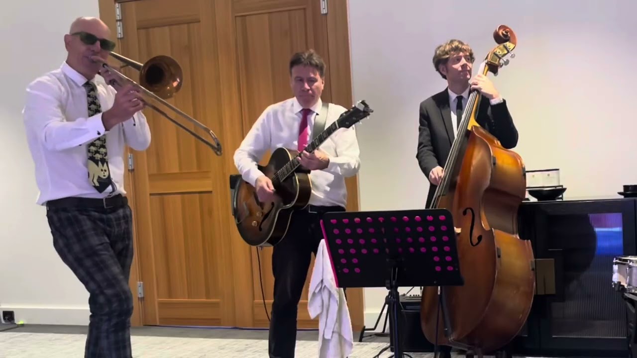 Besame Mucho performed on trombone during pre-dinner drinks by Slide McBride Band