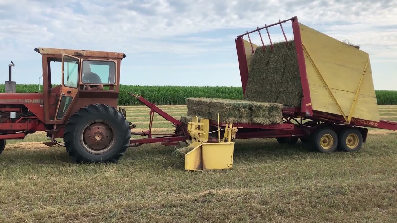 1034 bale wagon picking up bales