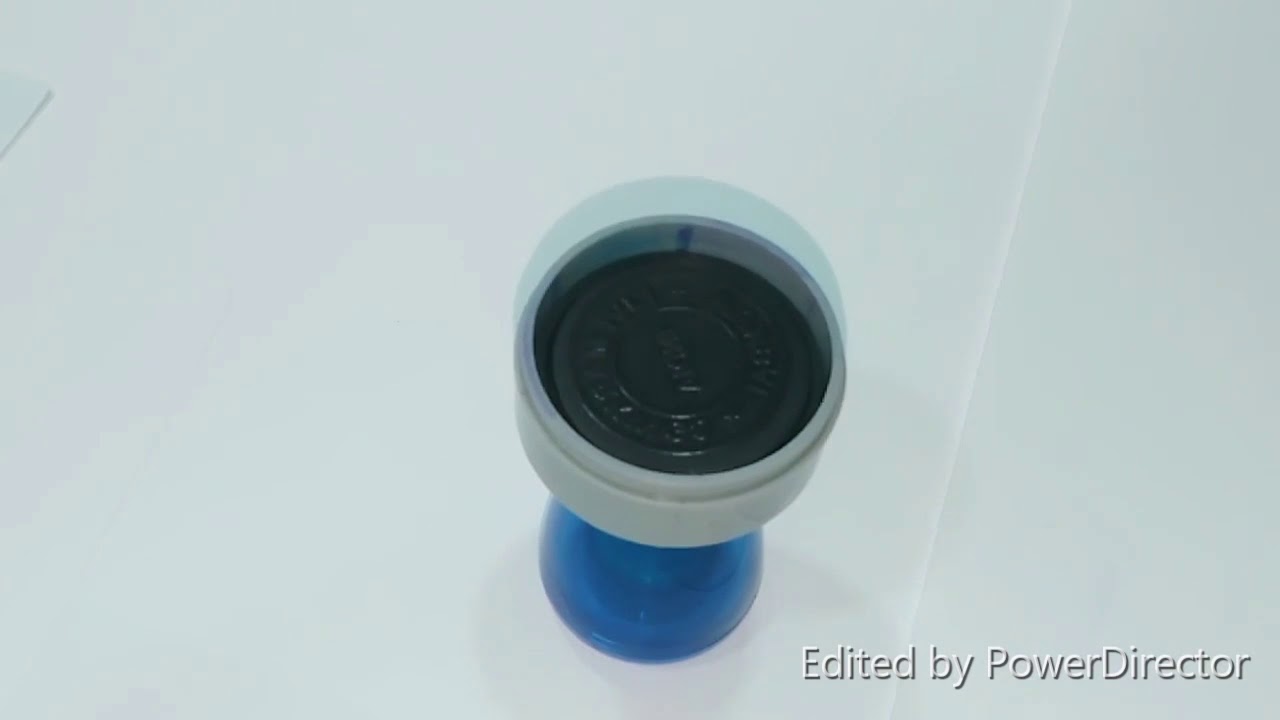 INKING OF PRE INK RUBBER STAMP ATOM MOUNT