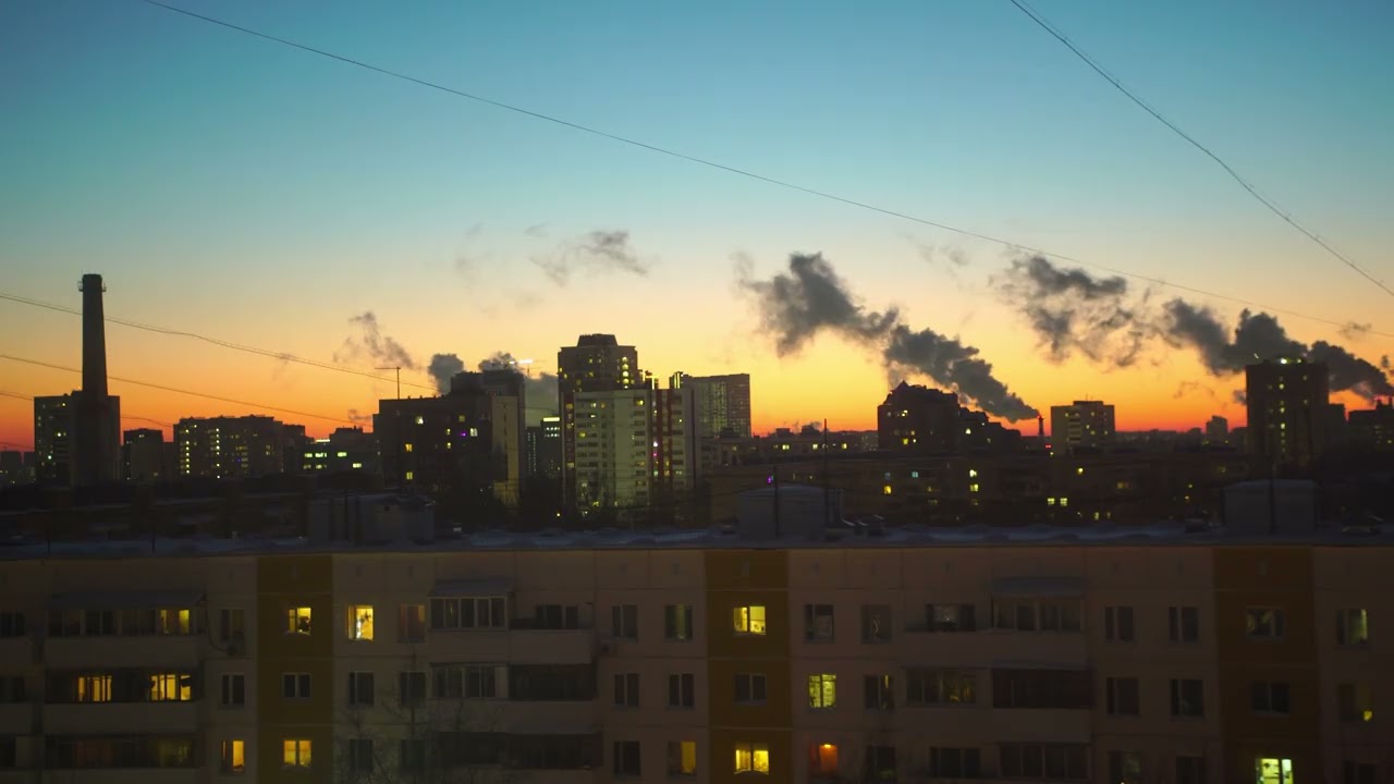 Послезакатное небо над районом. Пар котельных.