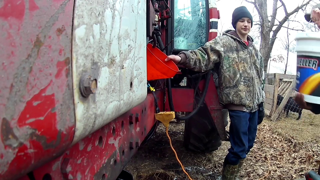 Full service IH 1086 changing engine oil&filters hydraulic filter and block heater